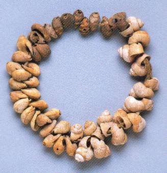 STRING OF PIERCED SHELLS