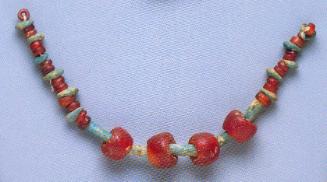 STRING OF CARNELIAN AND FAIENCE BEADS