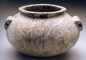 SQUAT VESSEL WITH PIERCED LUG HANDLES