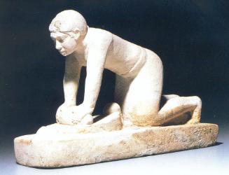 FIGURE OF A WOMAN GRINDING GRAIN