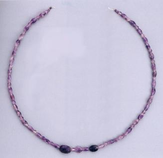 STRING OF SPHERICAL AND BIONICAL BEADS WITH TWO SCARABS