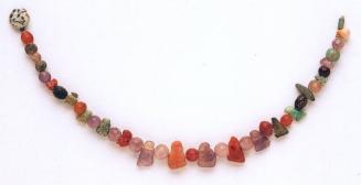 STRING OF BEADS AND AMULETS