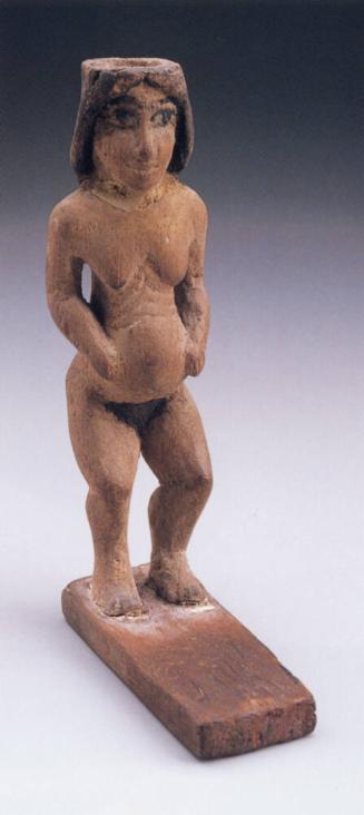 KOHL VESSEL IN THE FORM OF A NUDE WOMAN