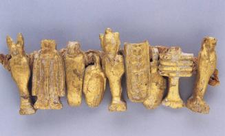 STRING OF GILT WOOD FUNERARY AMULETS