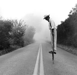 Man on stilts, 1999