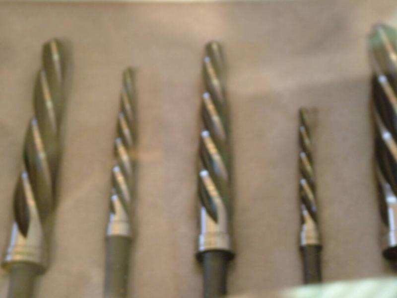 COLLECTION OF DRILL BITS (REAMERS 5) (AESTHETICALLY ARRANGED)
