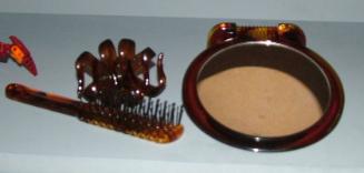 FAUX TORTOISE SHELL COMPOSITE SCULPTURE- MADE FROM FAKE TOROISE SHELL PRODUCTS