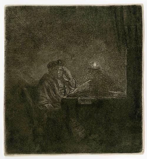 STUDENT AT A TABLE BY CANDLELIGHT