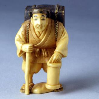 NETSUKE: TRAVELER WITH LANTERN